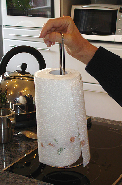 Paper towel holder with easy-grip handle