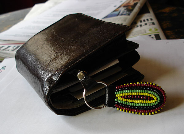 Wallet with key ring in zipper