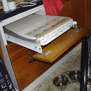 Kitchen drawer with built-in ironing board