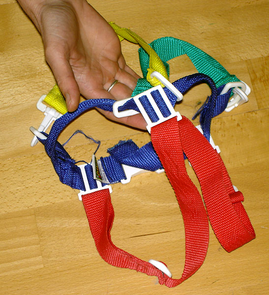 Modified baby harness, straps attached to snap-hook
