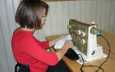 Controlling sewing machine with arms