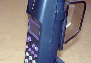 Portable telephone with homemade handle