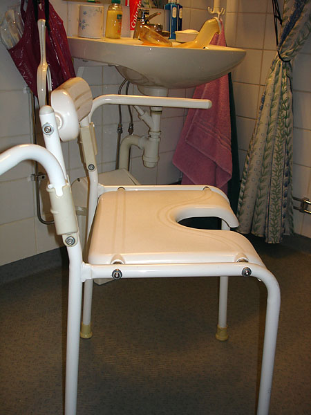 Transfers between wheelchair and shower stool