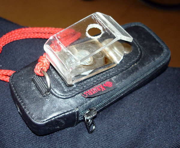 Plexiglas handle and string attached to mobile phone