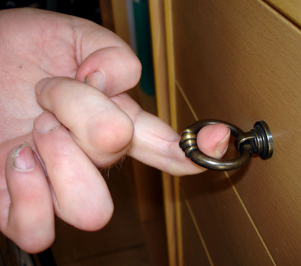 User opens drawer with index finger