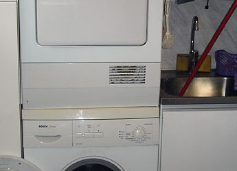 Accessible stacked washer/dryer