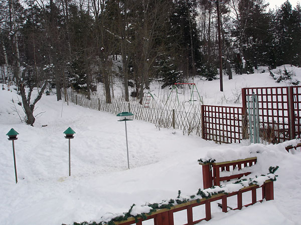 Fence around garden behind house