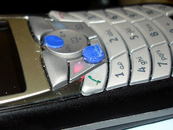 Anpassade knappar på telefon (närbild)