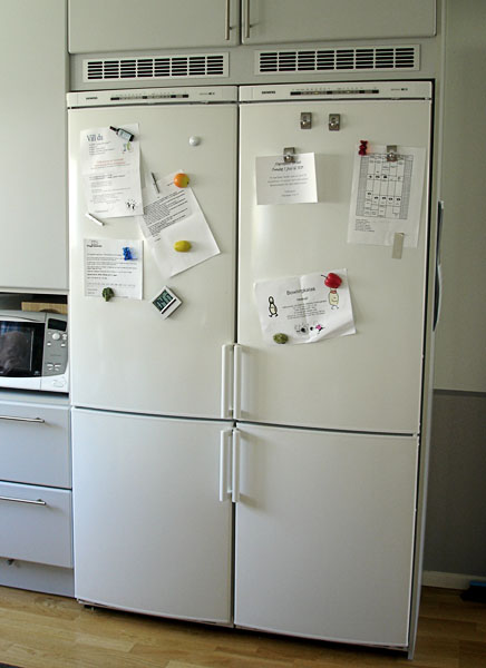 Two large refrigerators and freezers