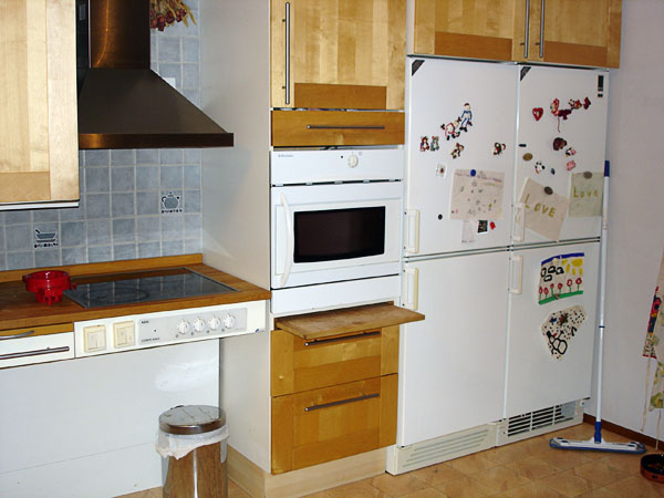 Refrigerator and freezer, oven in tall cabinet and stove without lower cabinets