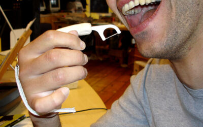Custom-designed dental floss holder