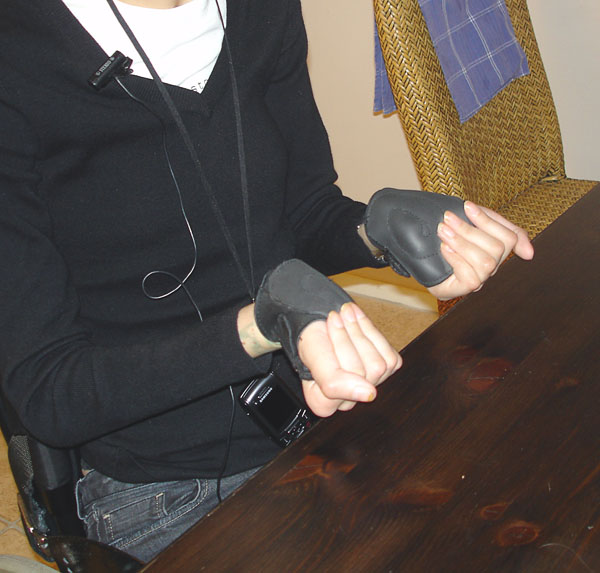 User with wheelchair gloves