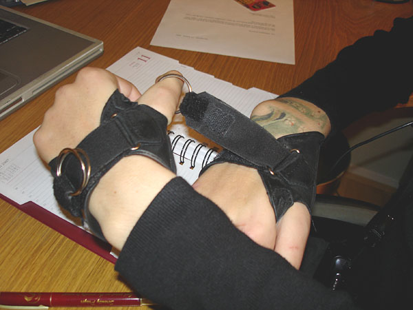 User tightens Velcro straps