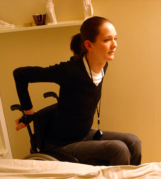 User pulls herself up to seated position