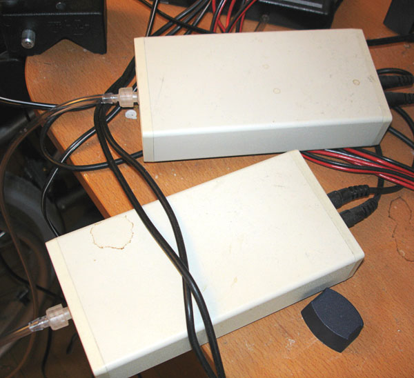 Two relay boxes for sip/puff controls.