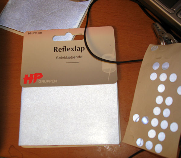 Sheet of reflectors in packaging from a hobby shop.