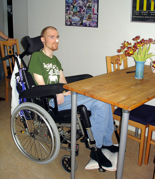 User sitting at dining table