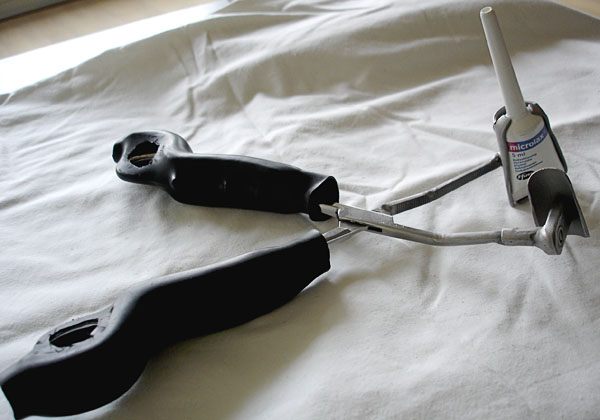 Adapted forceps with microlax tube in holder