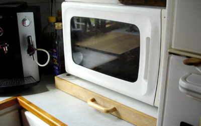 Microwave oven on sliding board