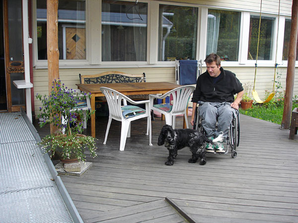 Wooden deck outside adapted house