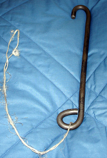 Metal hook with cord