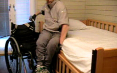 Transfer from wheelchair to bed