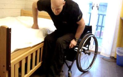 Transfer from wheelchair to bed