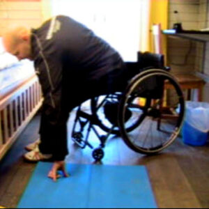 Förflyttning från rullstolen till golvet