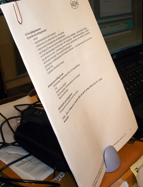Manuscript holder with paper