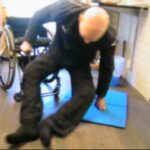 Transfer from floor to wheelchair with straight legs