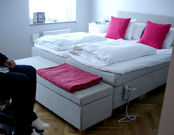 User's bedroom with double bed - both beds at same height