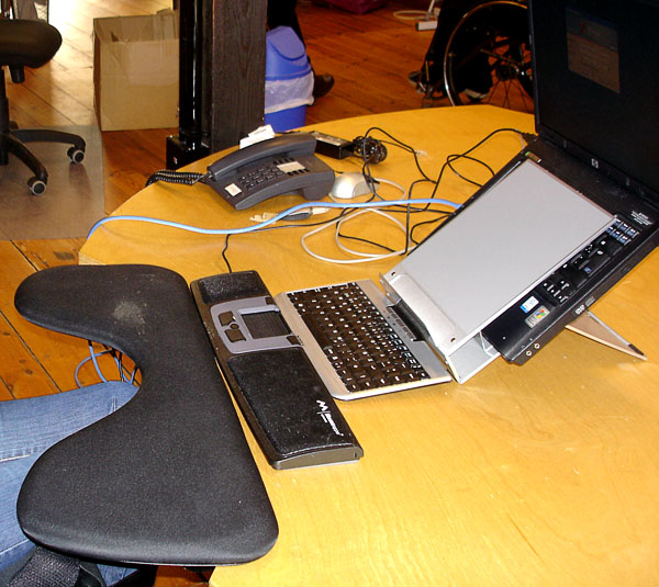 Computer workstation with forearm support