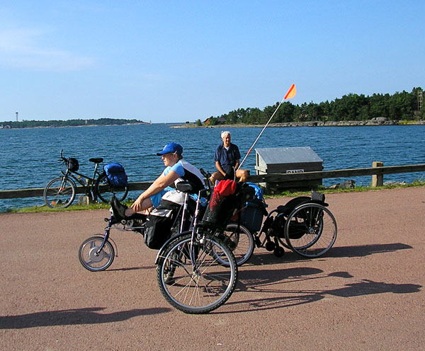 User riding motorized bicycle
