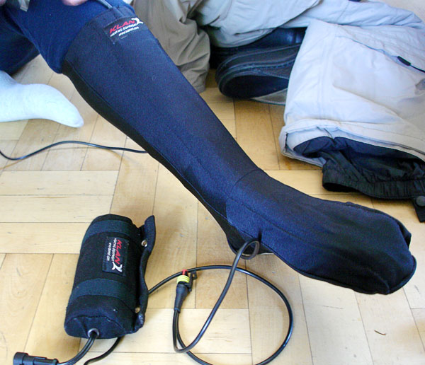 User wearing heated sock (close-up)