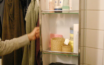 Rotating bathroom cabinet with mirror