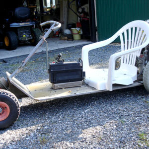 Go-cart with electric motor to trim flower beds