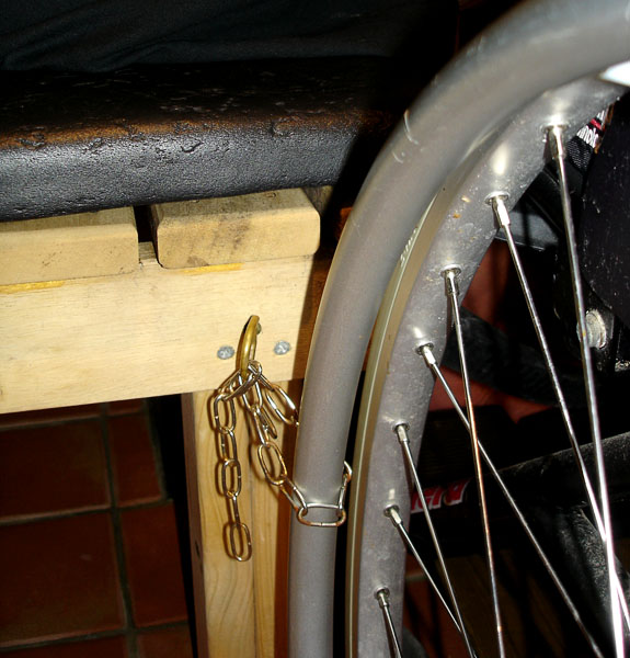 Wheelchair attached to shower stool