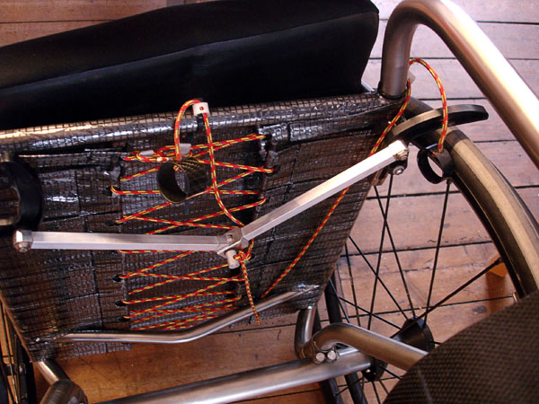 Wheelchair with brake handle and brake cord from below