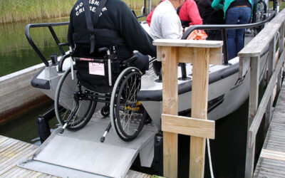 Folding bow ramp in accessible boat