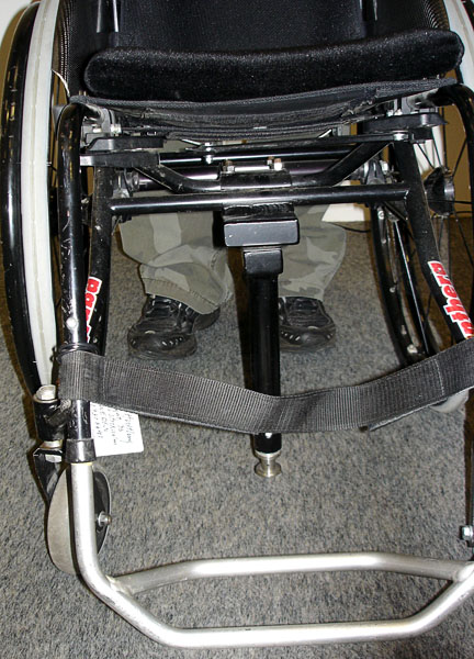 Rod on wheelchair to secure it