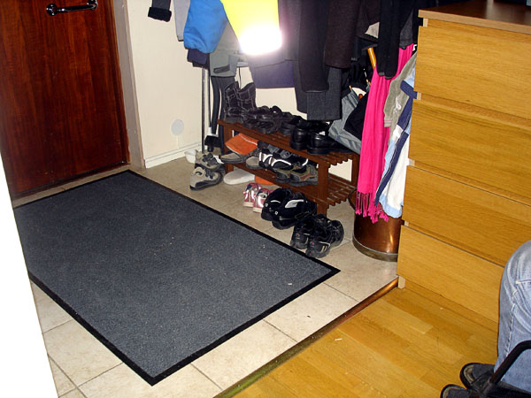 Hall with absorbent mat
