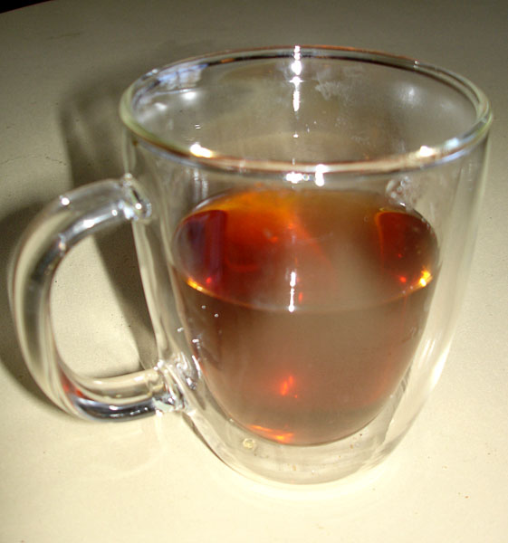Tea mug with double wall glass (close-up)