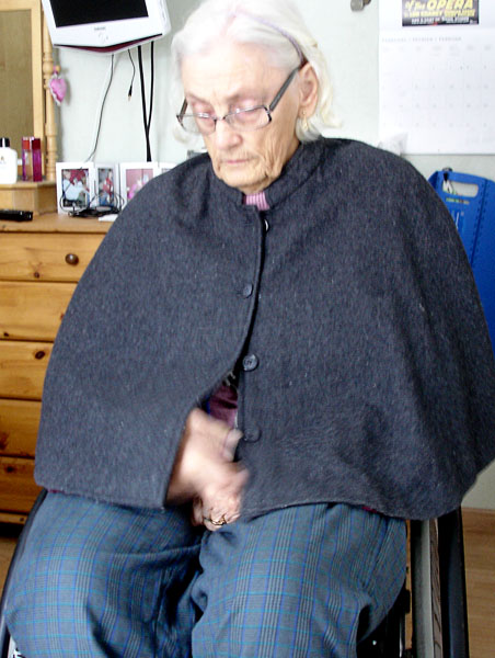 User wearing her cape