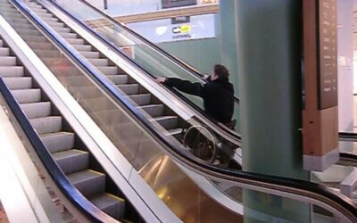 Ride up an escalator in a wheelchair