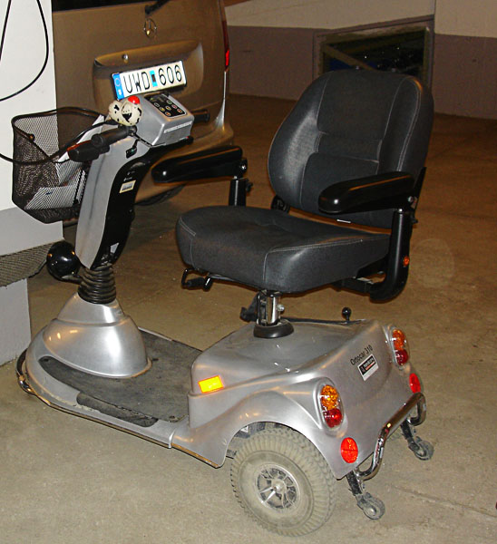 Scooter, seat rotated to facilitate getting on.