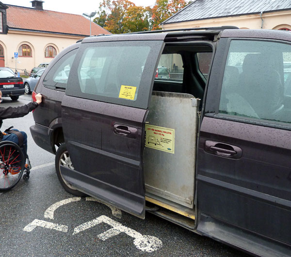 User operates side door/lift from outside the vehicle