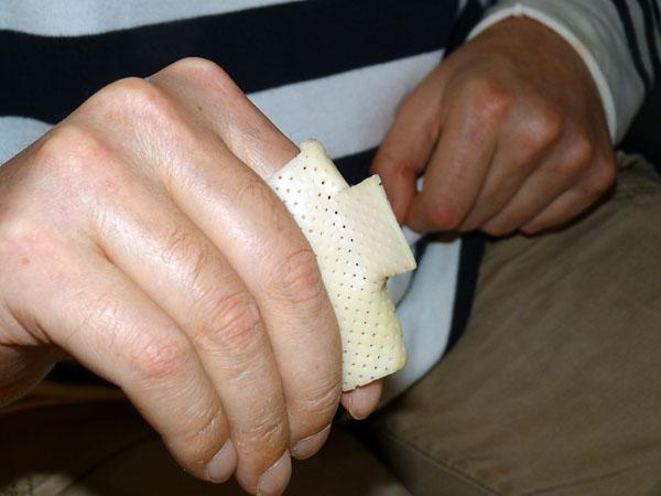 User with finger sleeve