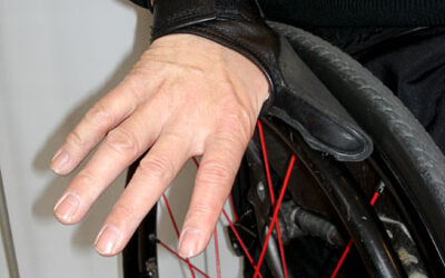 Custom-made wheelchair gloves