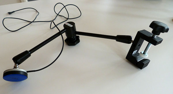 Control button on a stand with a bracket  (close-up)