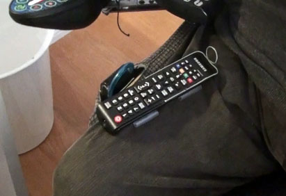 When adapted with cut pieces of tubing the remote control unit sits stably on the user’s lap